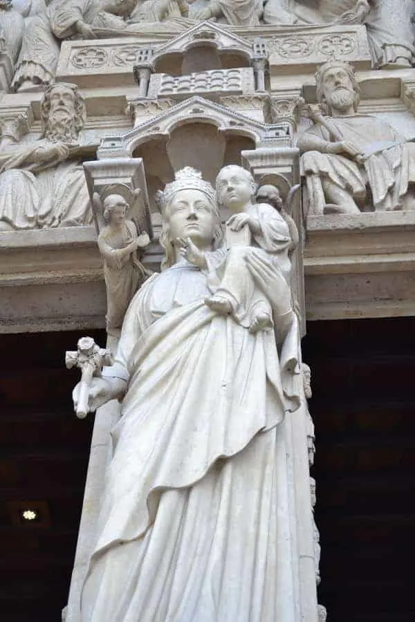 Statue of Virgin Mary at Notre Dame Cathedral in Paris